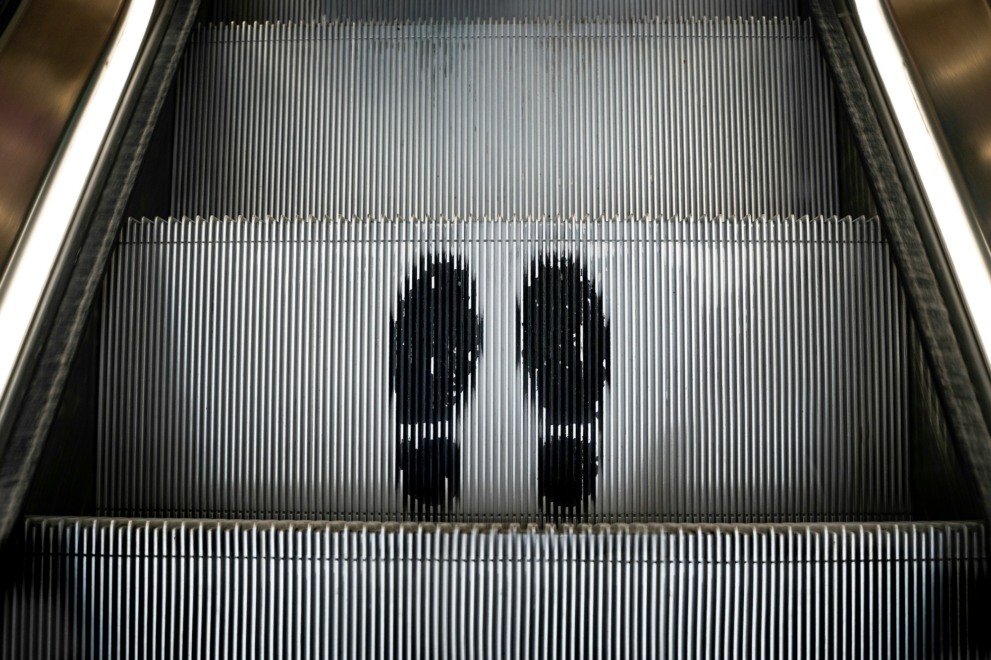 Footprints on escalator 