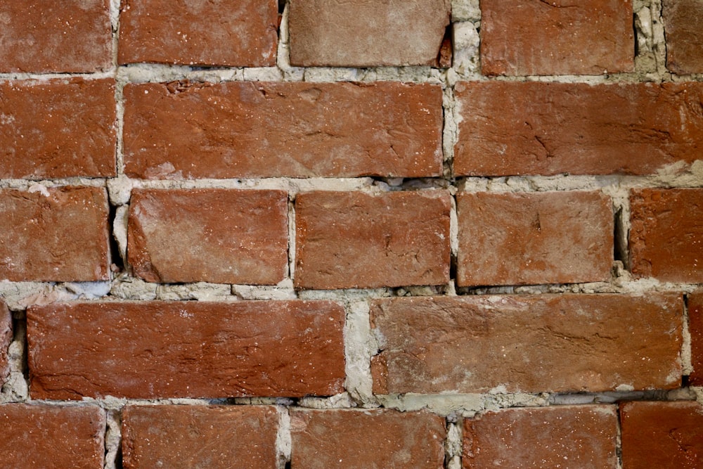 a close up of a brick wall made of bricks