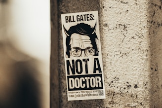 a sticker on the side of a building that says not a doctor
