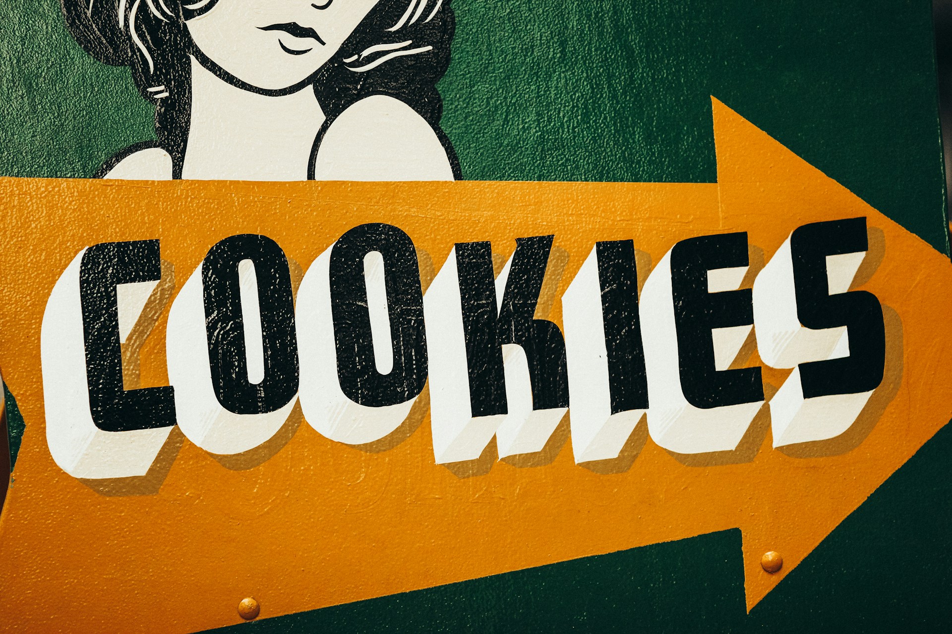 a close up of a sign with a woman on it
