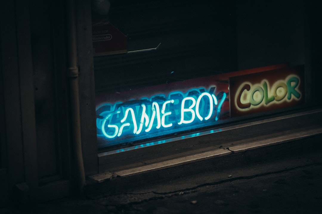 a neon sign that says game boy color,