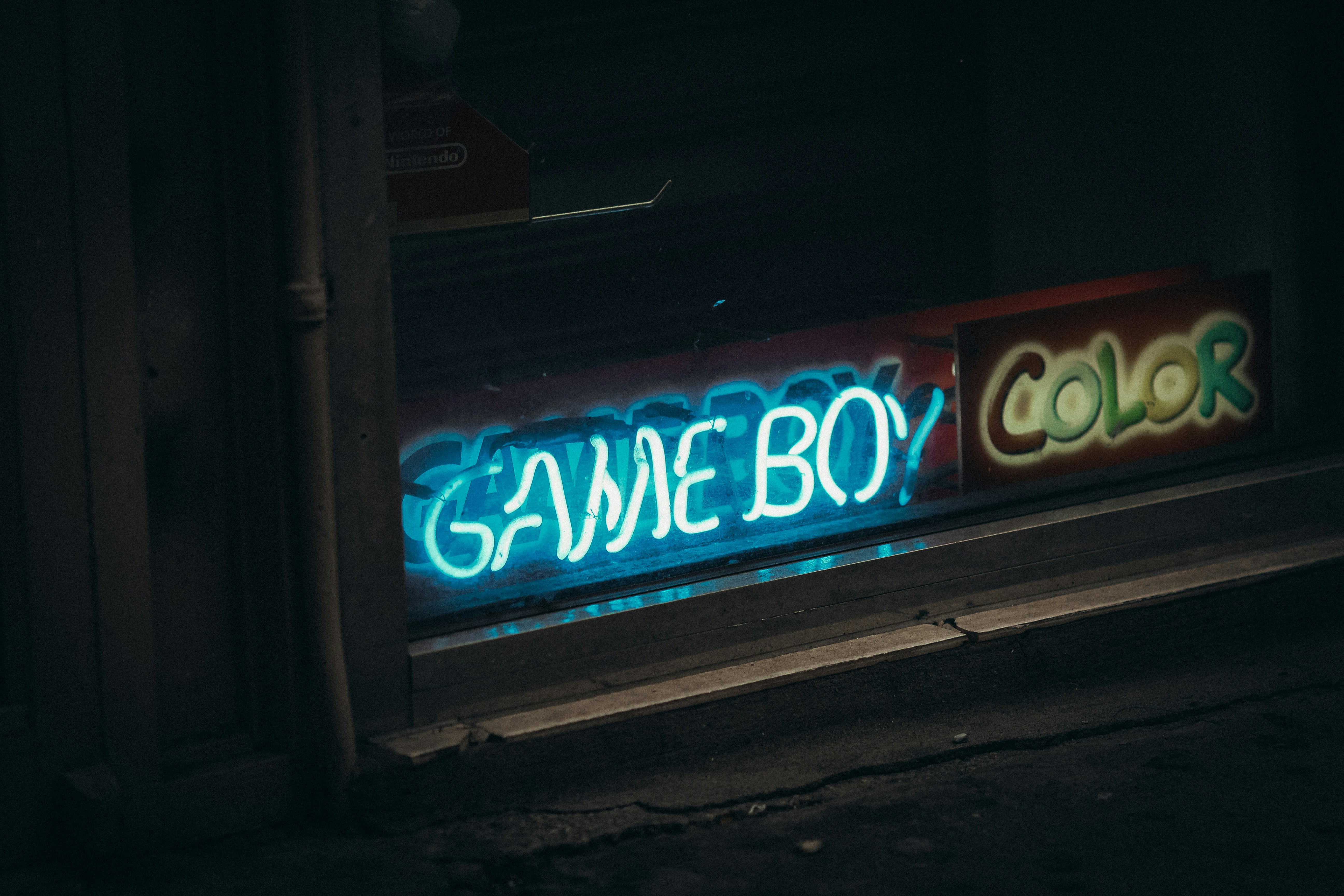 a neon sign that says game boy color