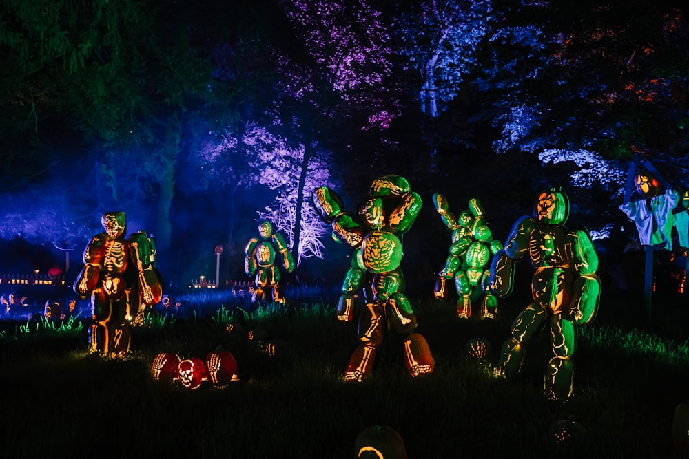 a group of people in costume standing in the grass