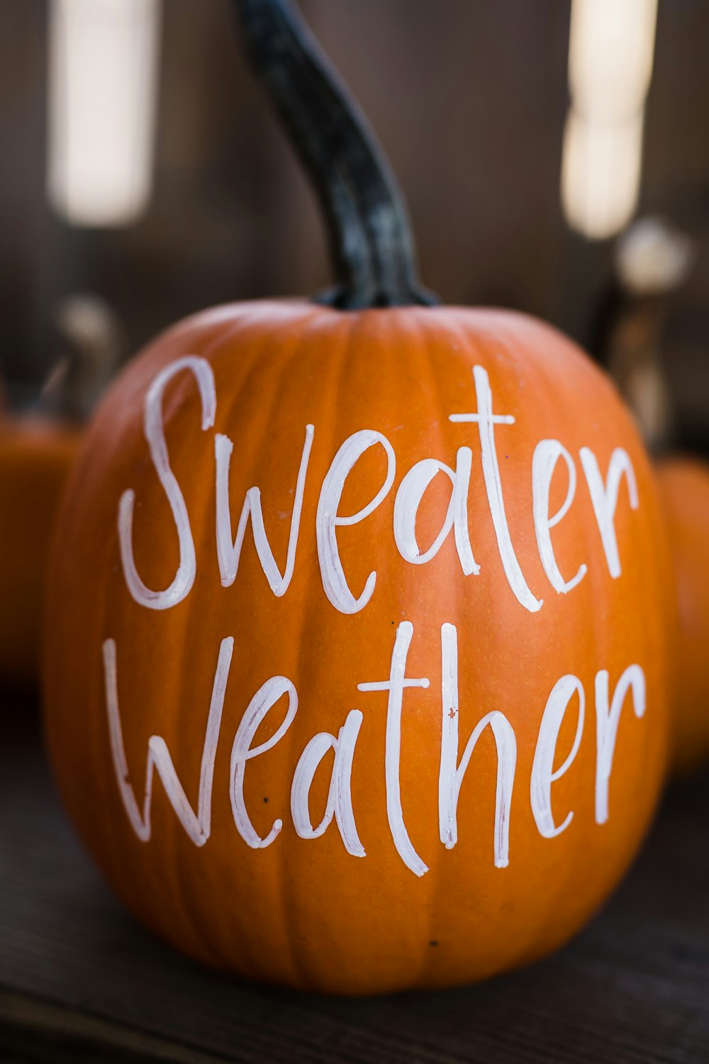 a couple of pumpkins that are sitting on a table