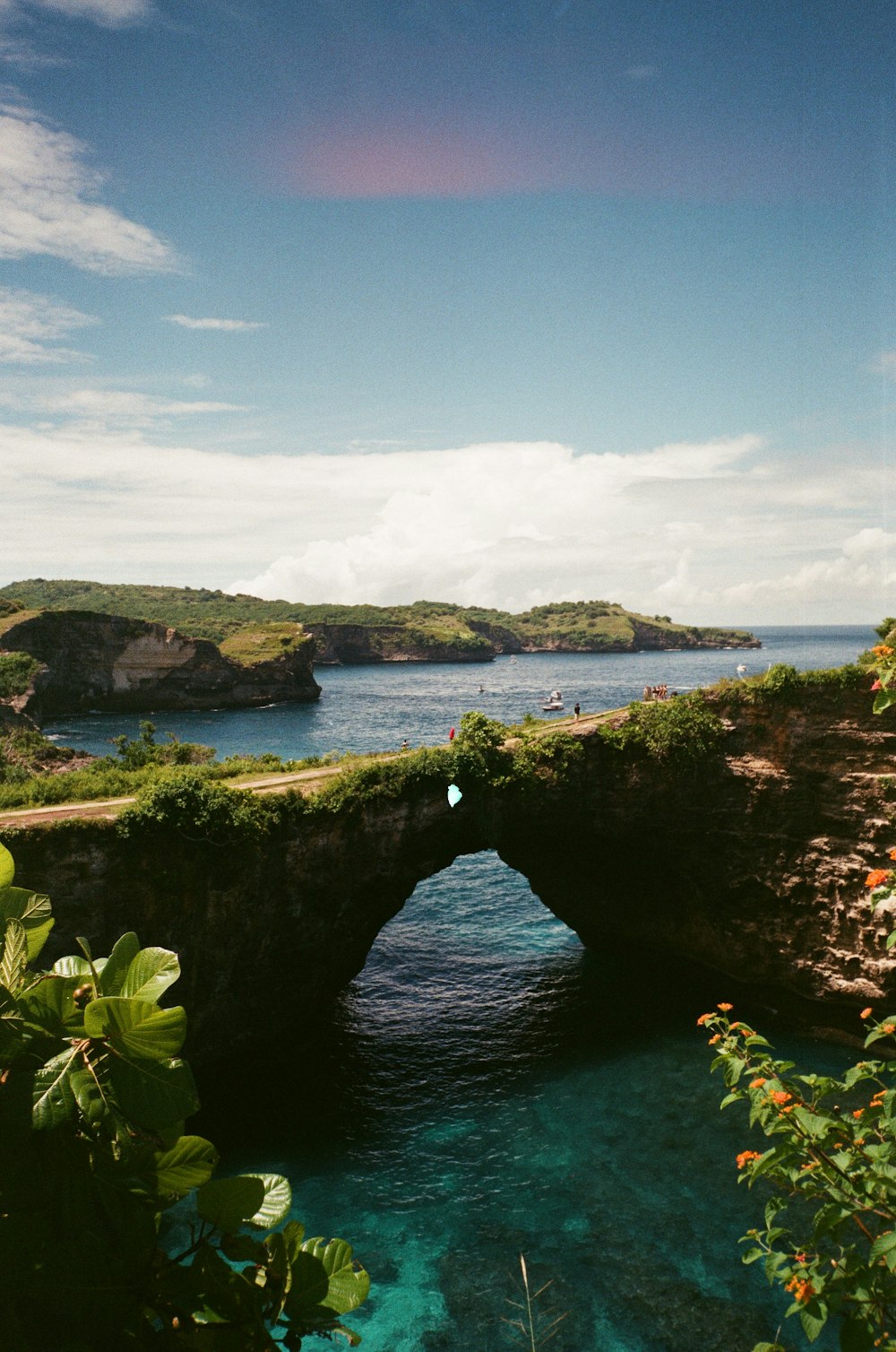 a small bridge over a body of water