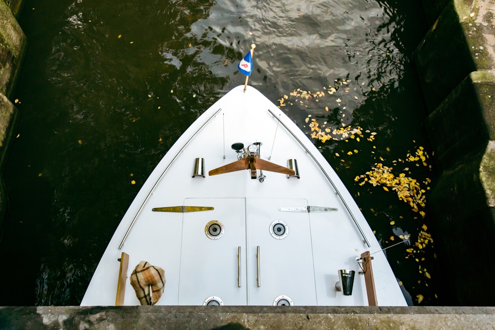 a boat is docked at a dock in the water