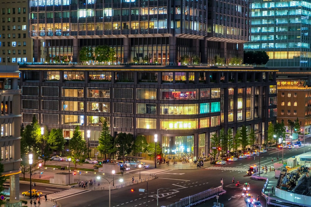 a very tall building with lots of windows at night