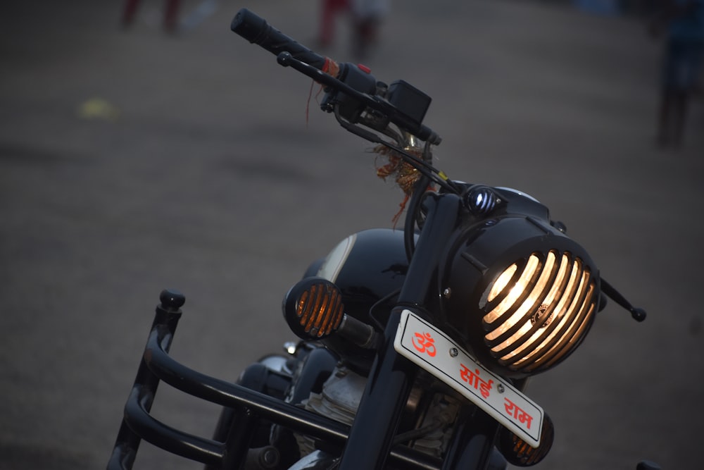 a close up of a motorcycle with a light on it