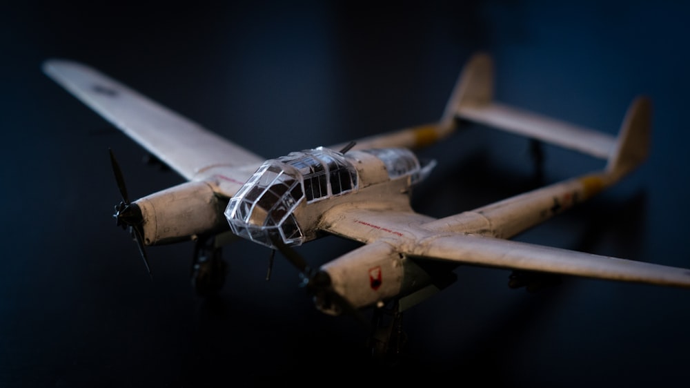 a toy airplane is sitting on a table