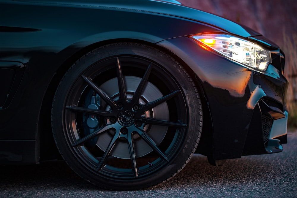 a close up of the front of a black car