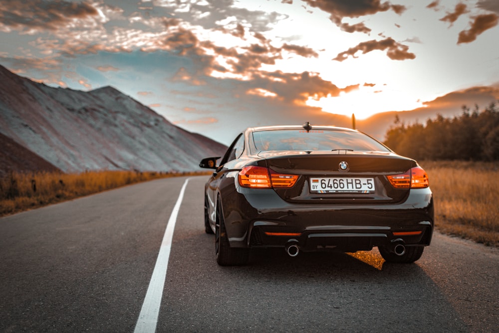 a car is parked on the side of the road