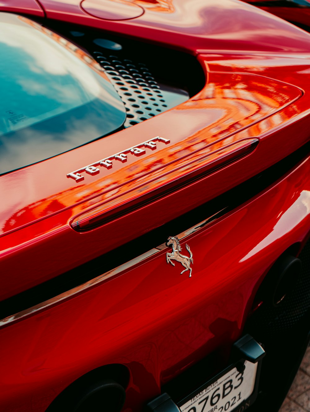 a close up of a red sports car