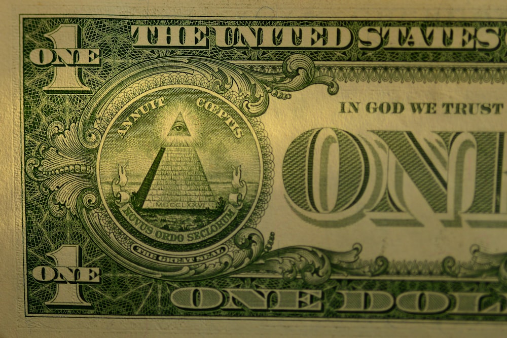 a close up of a one dollar bill