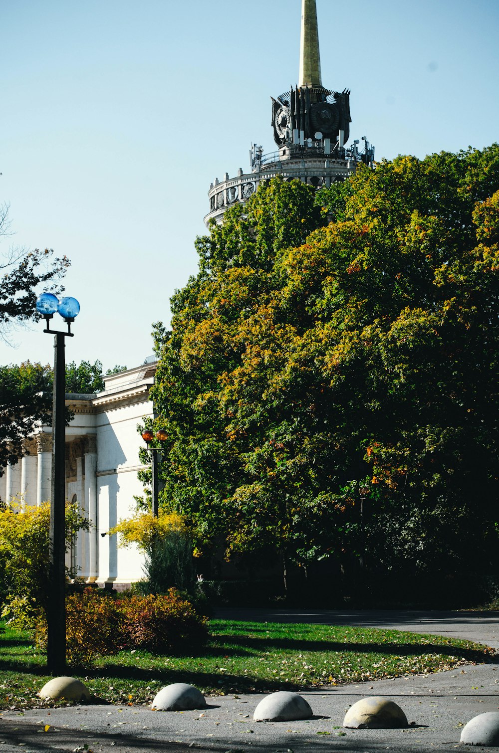 a building with a clock tower in the background