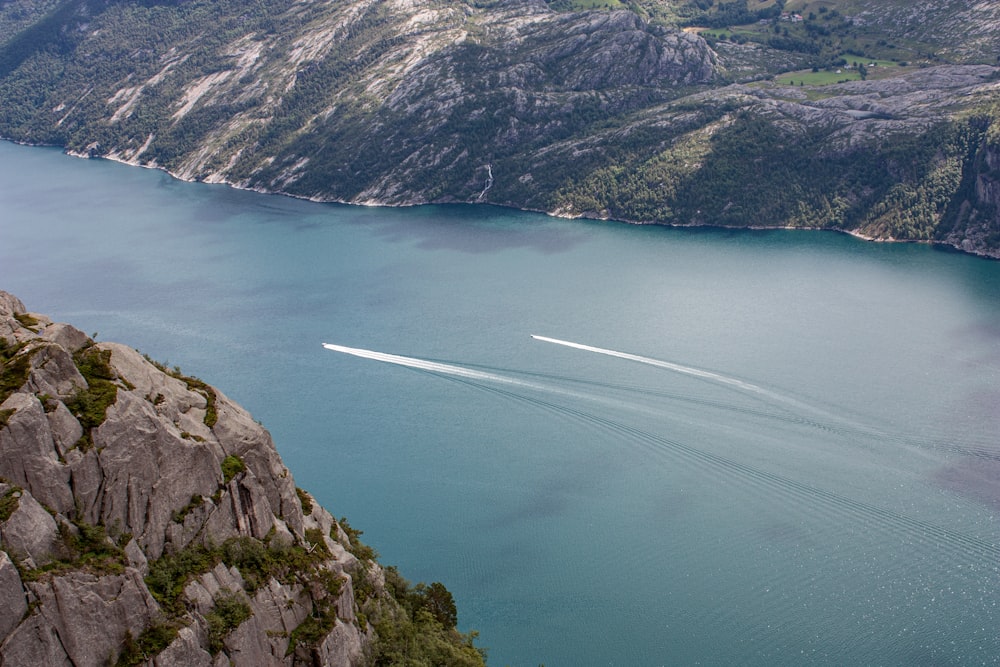 a boat is in the middle of a large body of water