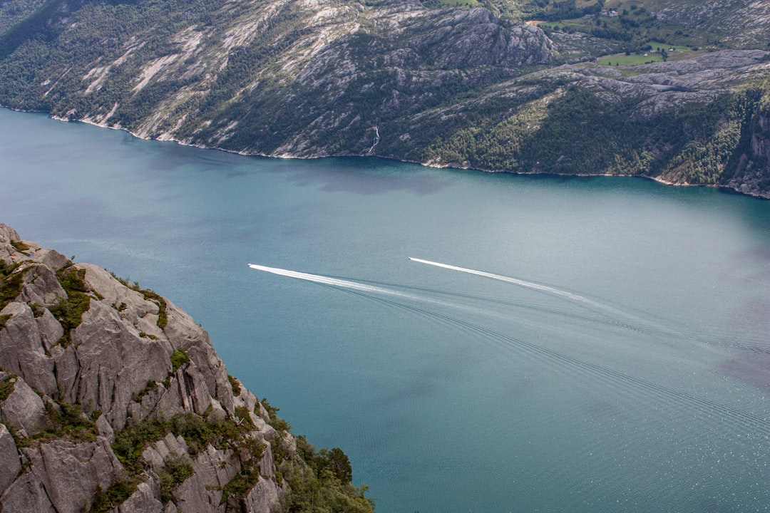 a boat is in the middle of a large body of water,