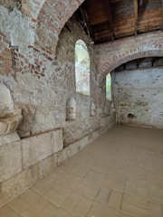 A spacious room featuring rustic decor.