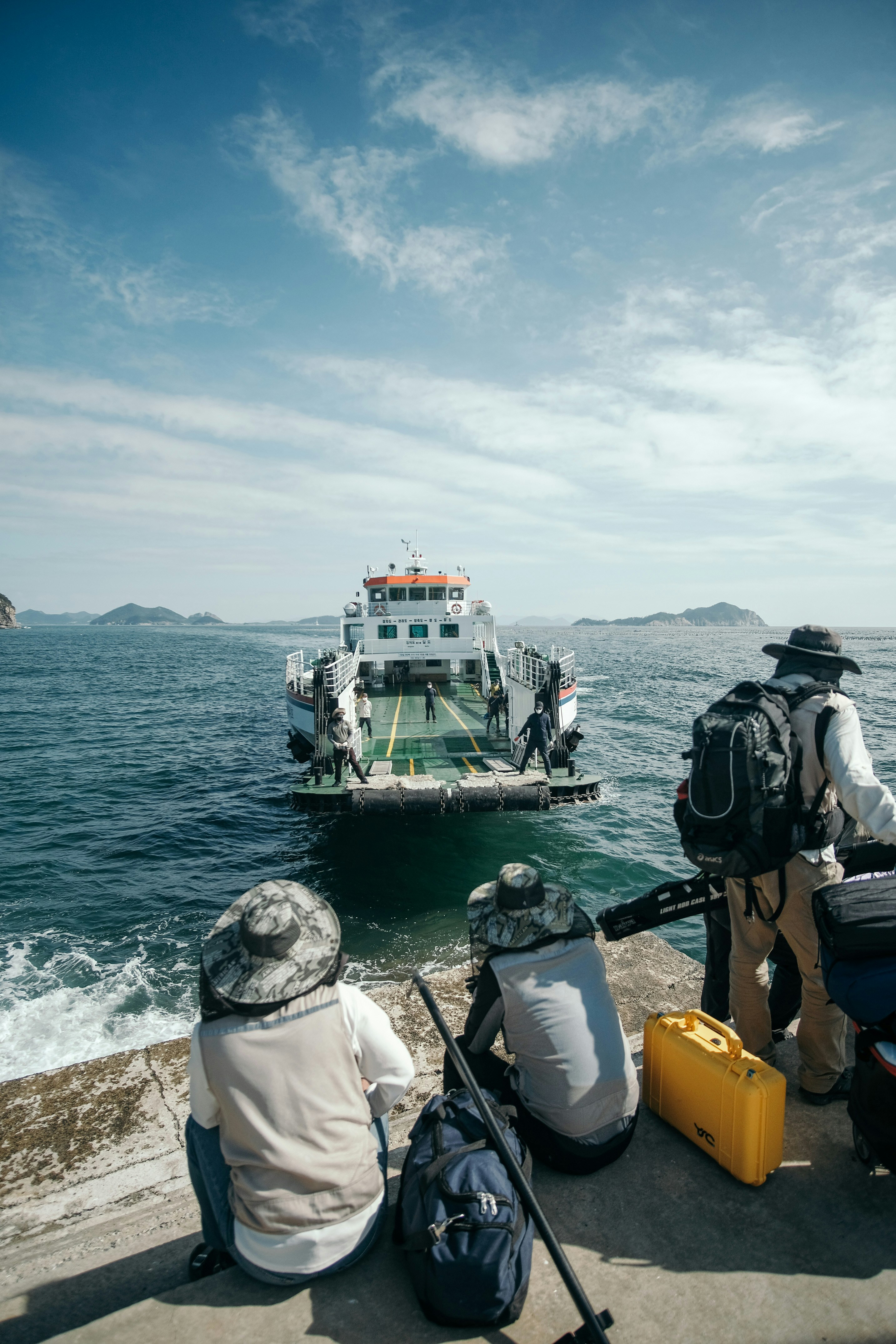 Island travel with backpack, ferry, and map