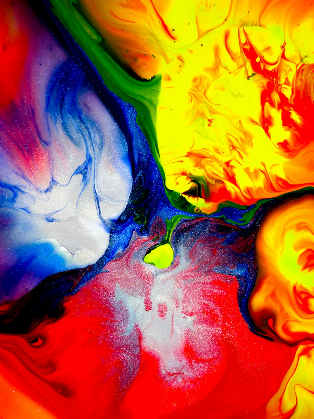 a close up of a multicolored abstract painting