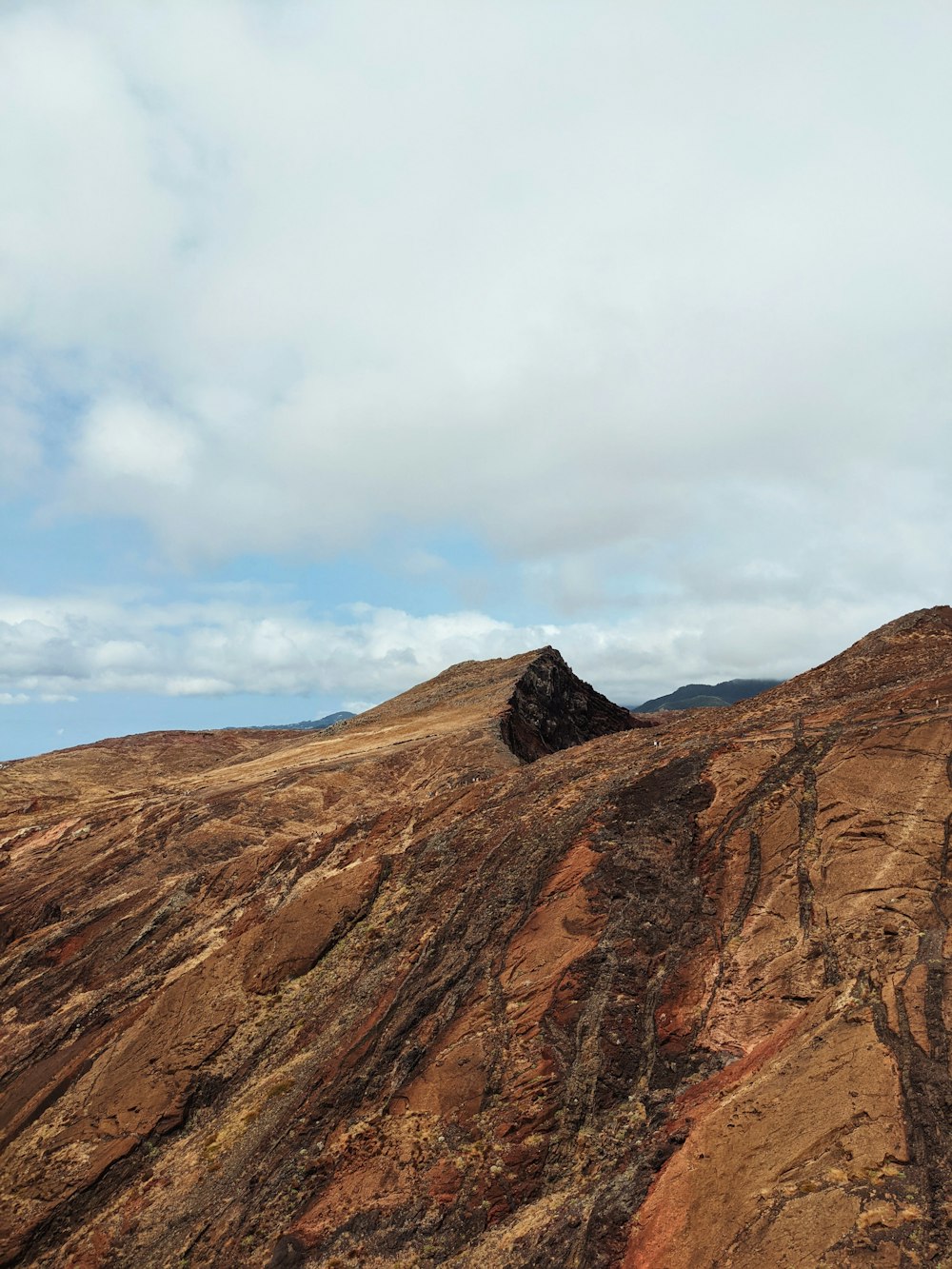 a mountain with a very tall rock face