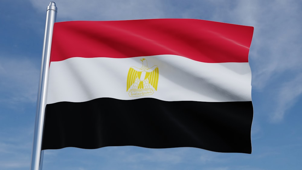 the flag of egypt waving in the wind