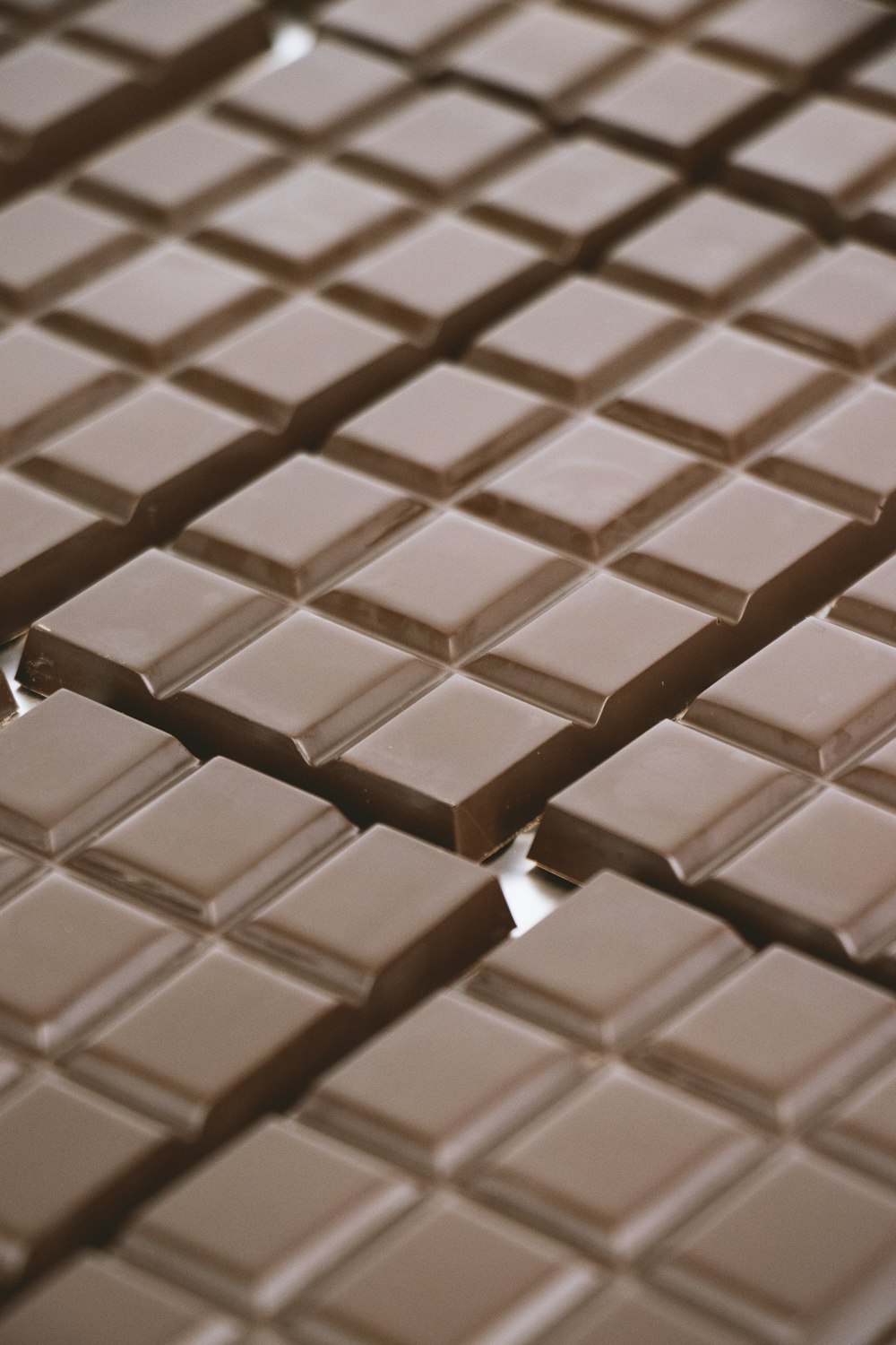 a close up of a chocolate bar with a bite taken out of it