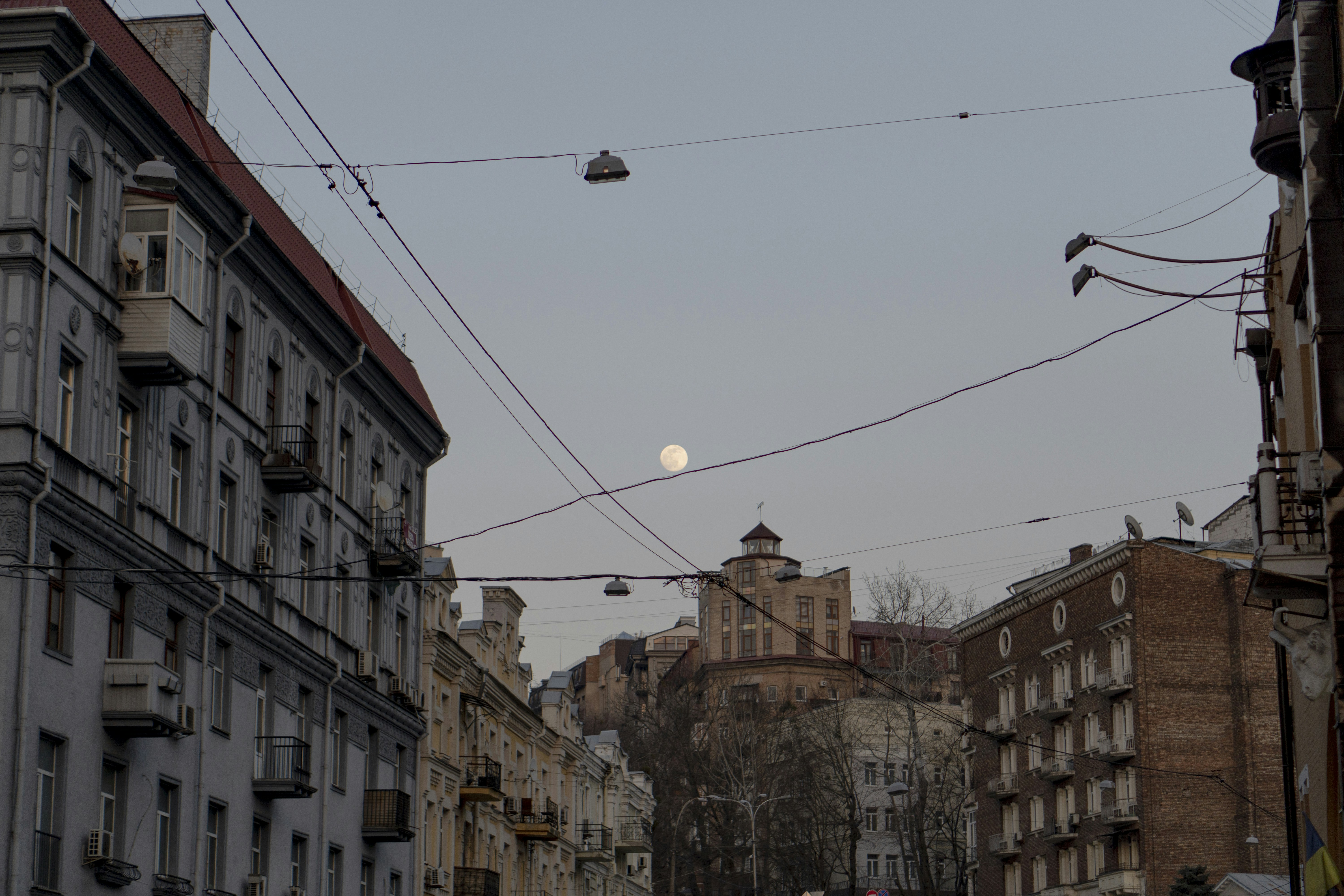 a city street filled with lots of tall buildings