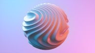 A 3D object with a swirled, textured surface appears to be floating. The object features gradients of cool blue and warm orange tones, set against a smooth, gradient background transitioning from blue to pink.