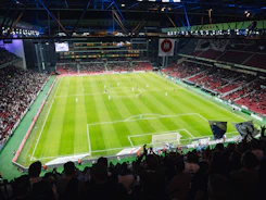 a soccer stadium filled with lots of people
