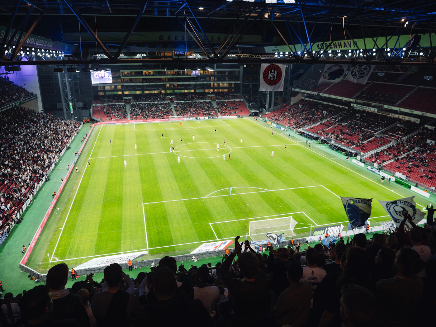 Stadium crowd showing the audience scale a single mass-texting bulk SMS broadcast can reach