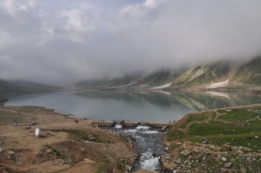 a large body of water surrounded by mountains