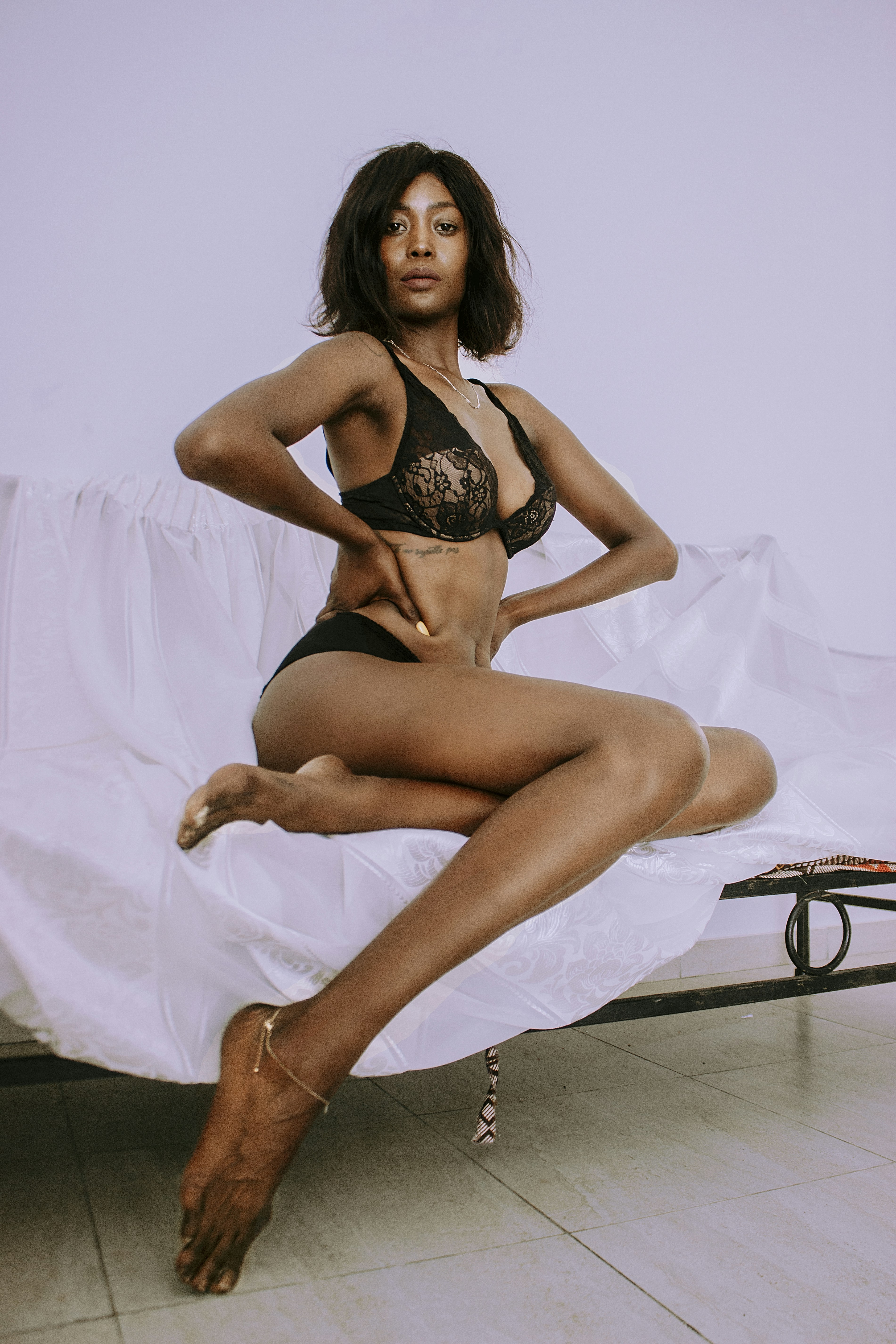 Boudoir boudoir portrait of a beautiful ebony model weaaring a trendy lingerie.