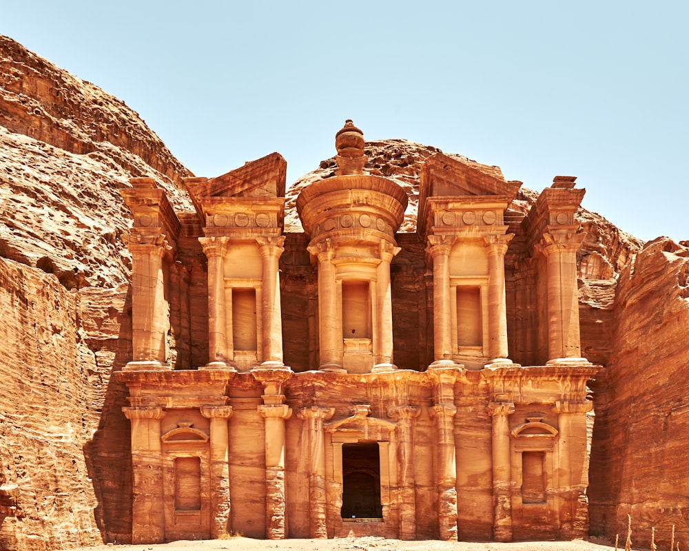 a large building in the middle of a desert