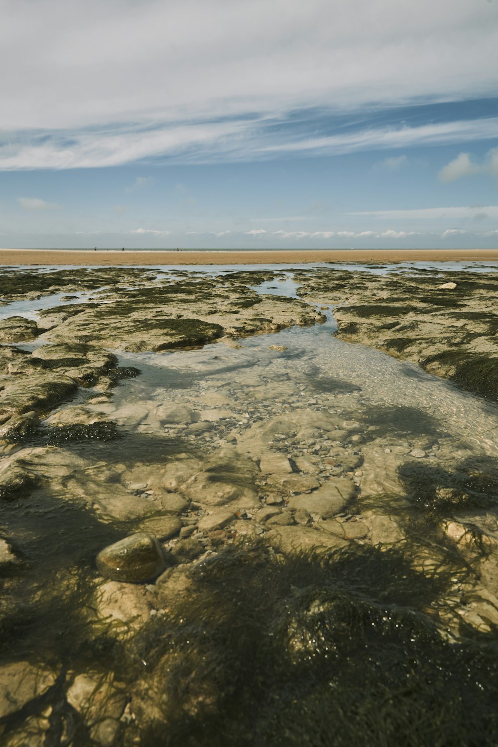 a large body of water surrounded by rocks