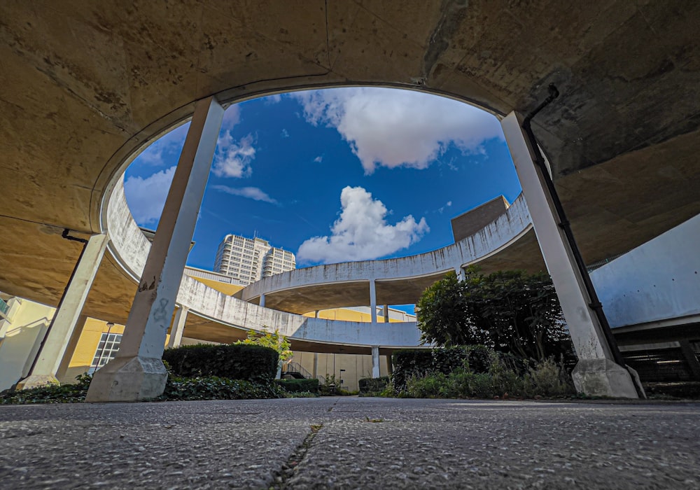 a view of a building through a circular window