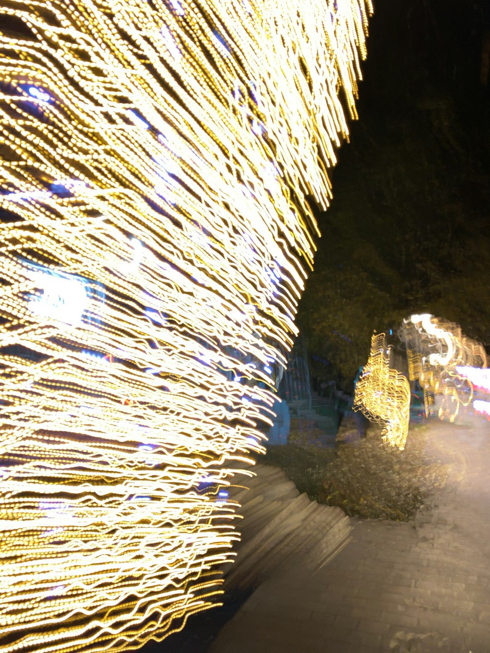 a blurry photo of a street at night