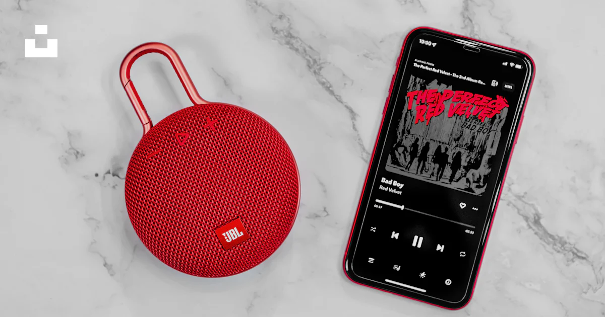 Red.mp3 A red portable speaker next to an mp3 player photo – Free Red Image on ...