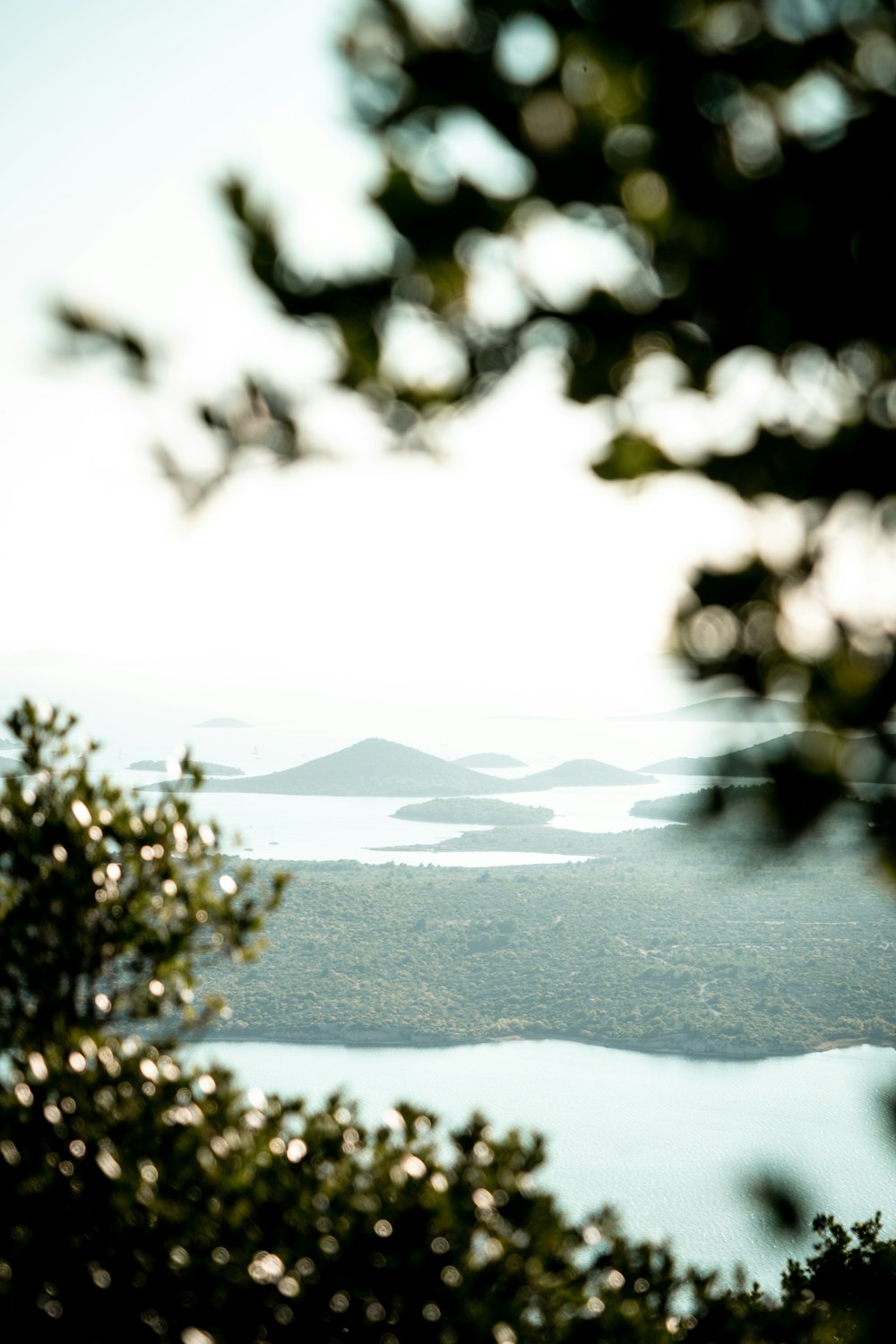 a view of a body of water from a hill