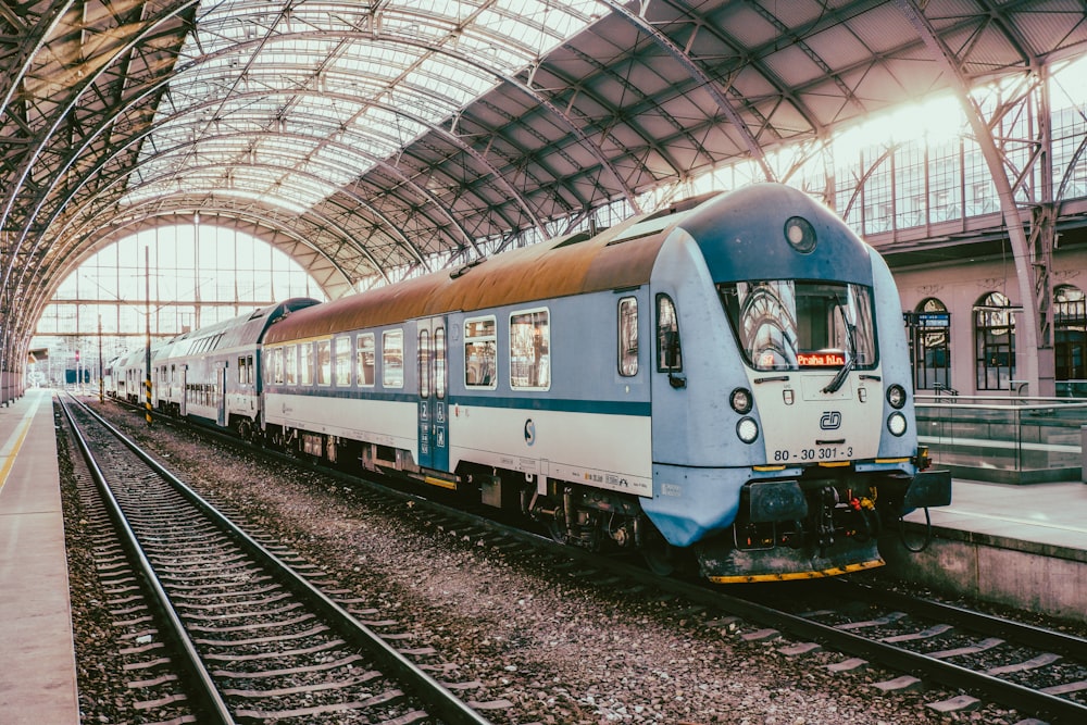 a passenger train pulling into a train station