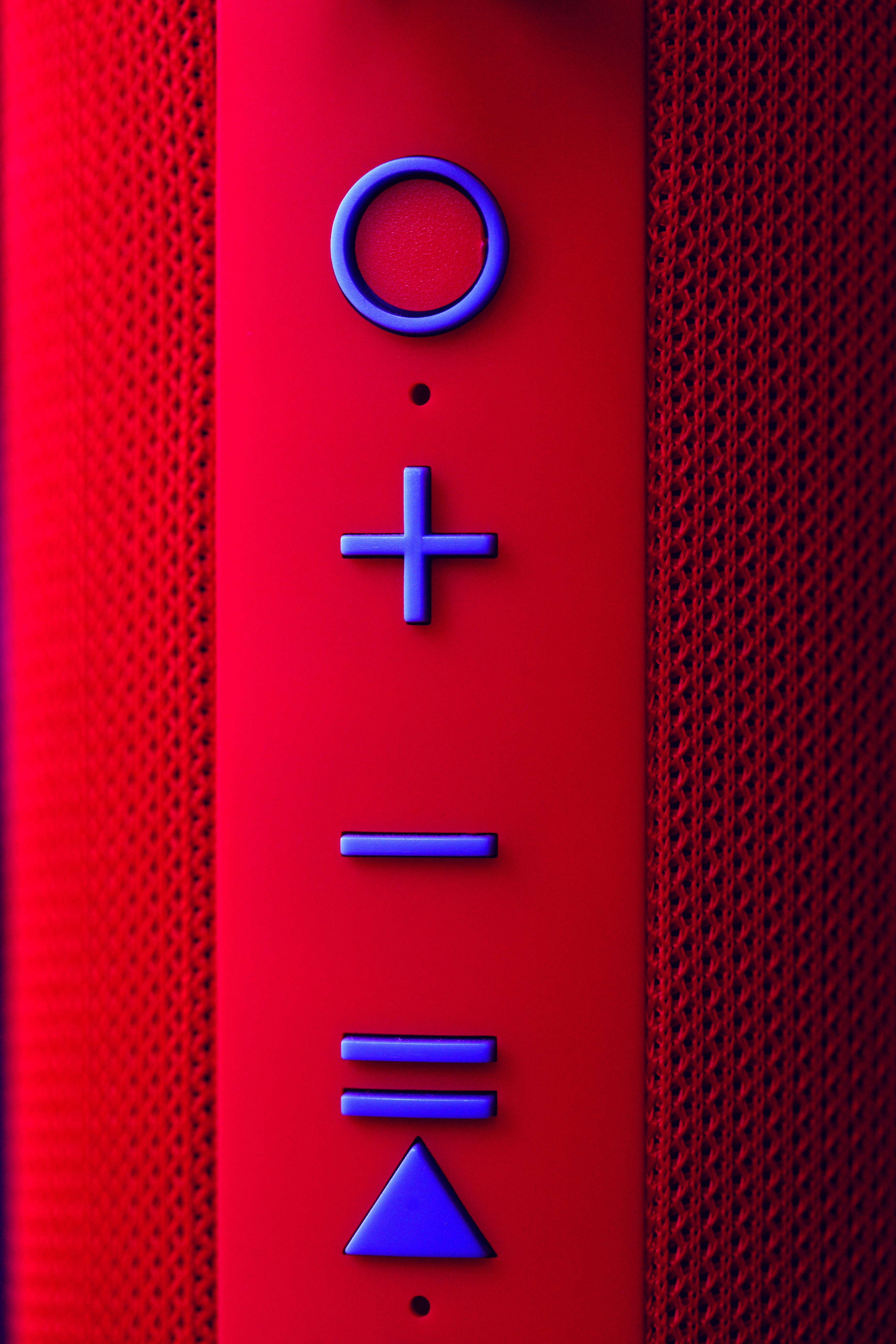 a close up of a button on a speaker