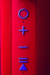 a close up of a button on a speaker