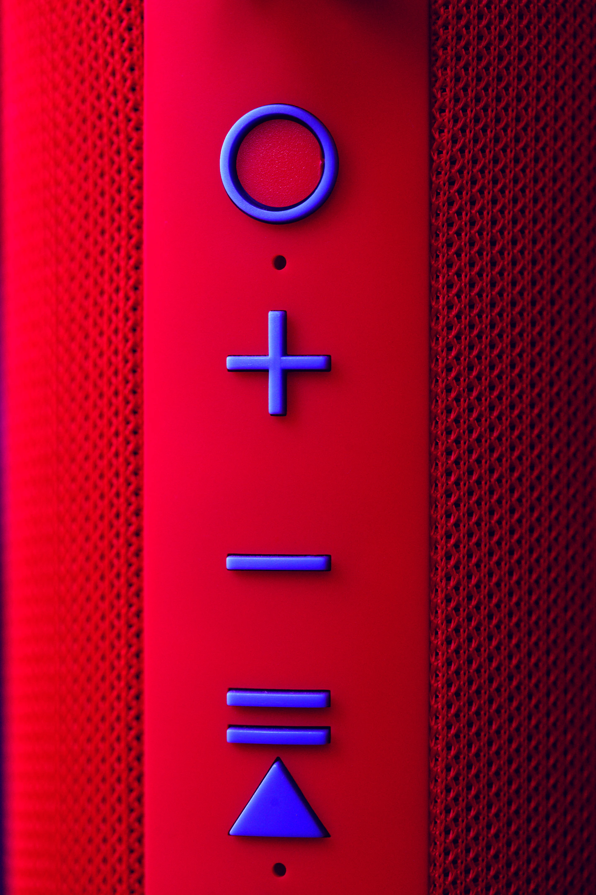 a close up of a button on a speaker