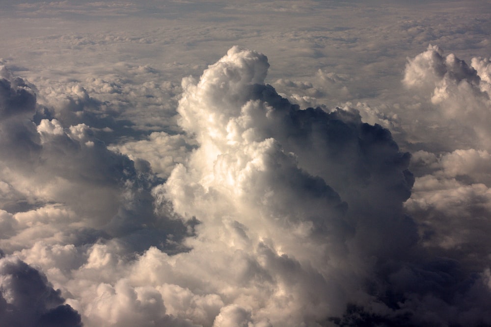 a view of clouds from an airplane window