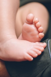 a close up of a baby's bare foot