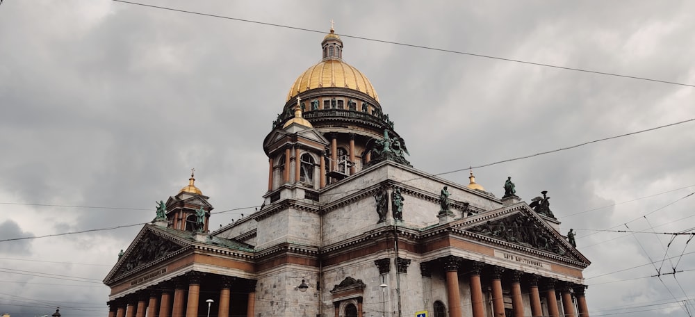 a large building with a golden dome on top