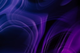 a blue and purple background with swirls