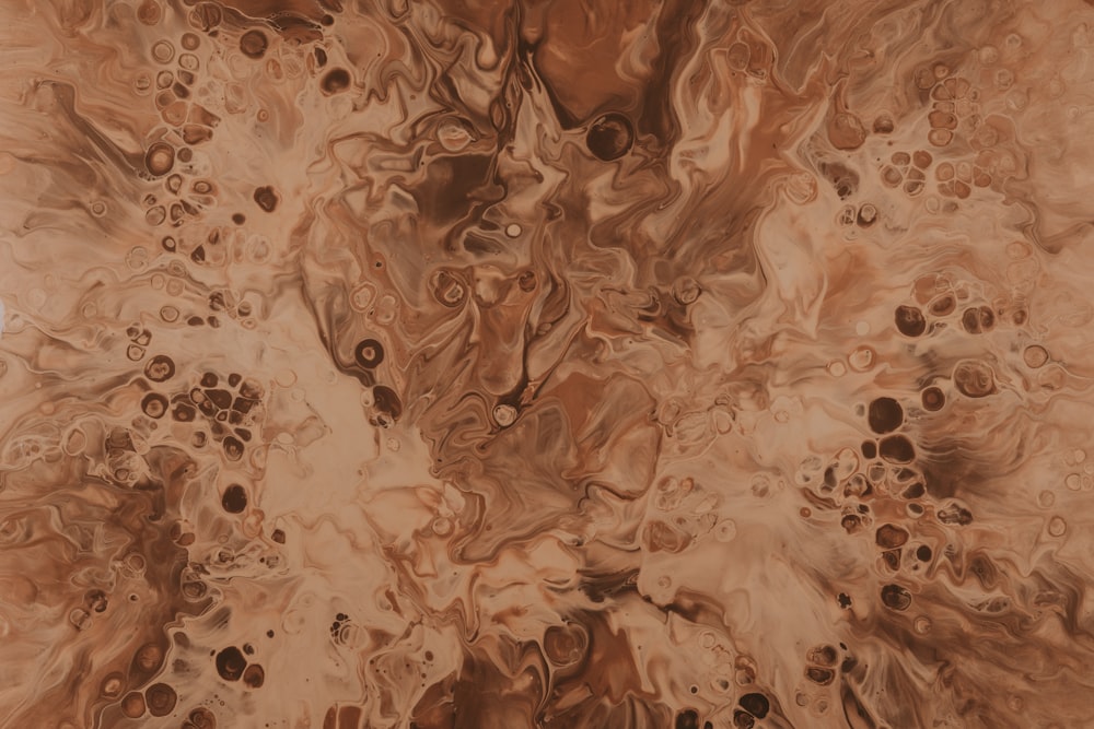 a close up of a marbled surface with lots of bubbles
