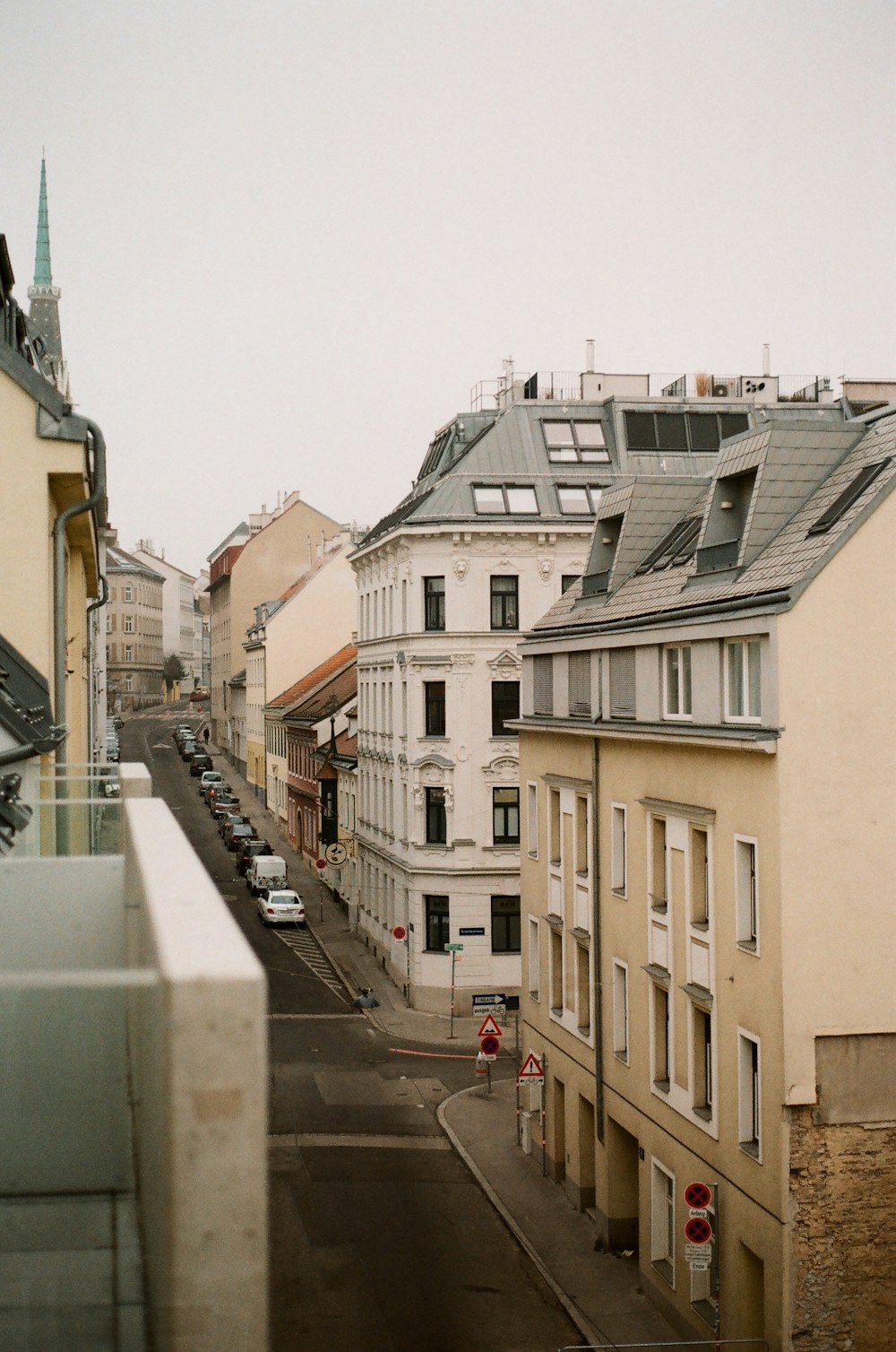 a view of a city street from a window