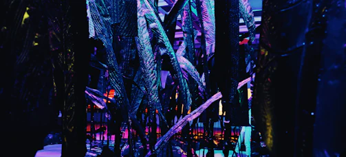 Emerging network nodes glowing within a dark, minimalist digital grid