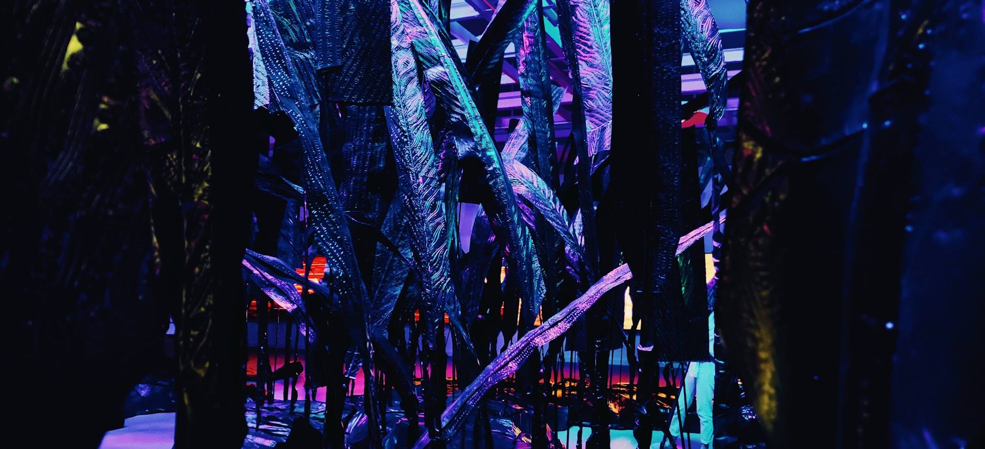 Neon-lit network of interconnected APIs and CRM systems visualized as glowing data streams in a dark futuristic setting.